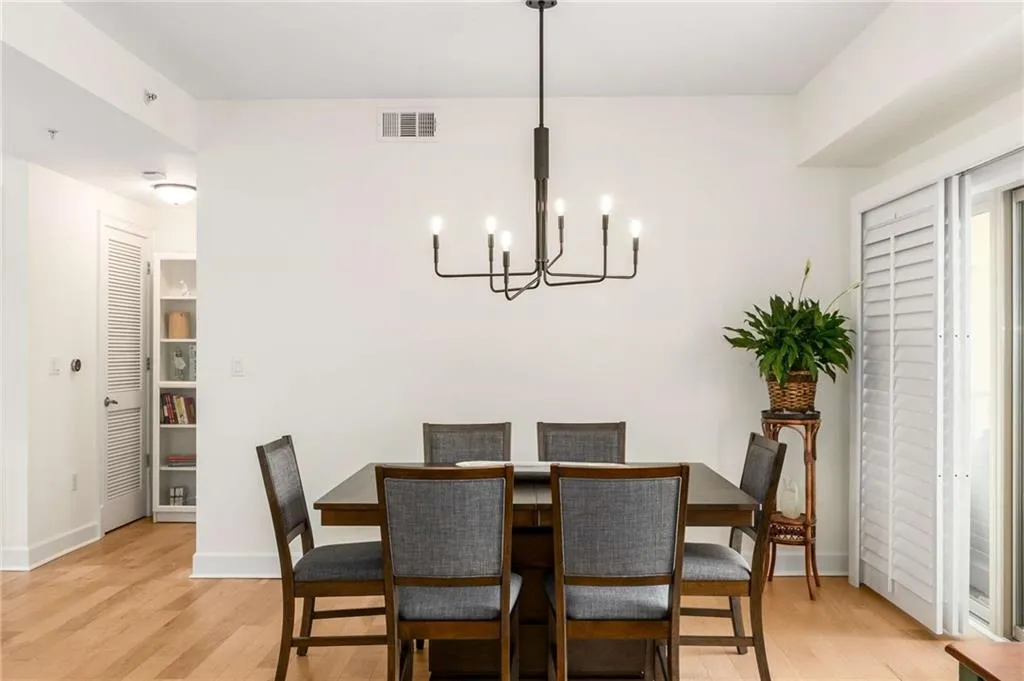Beautiful upgraded light fixtures add a modern flair. Sliding plantation shutters located on the patio doors also included.