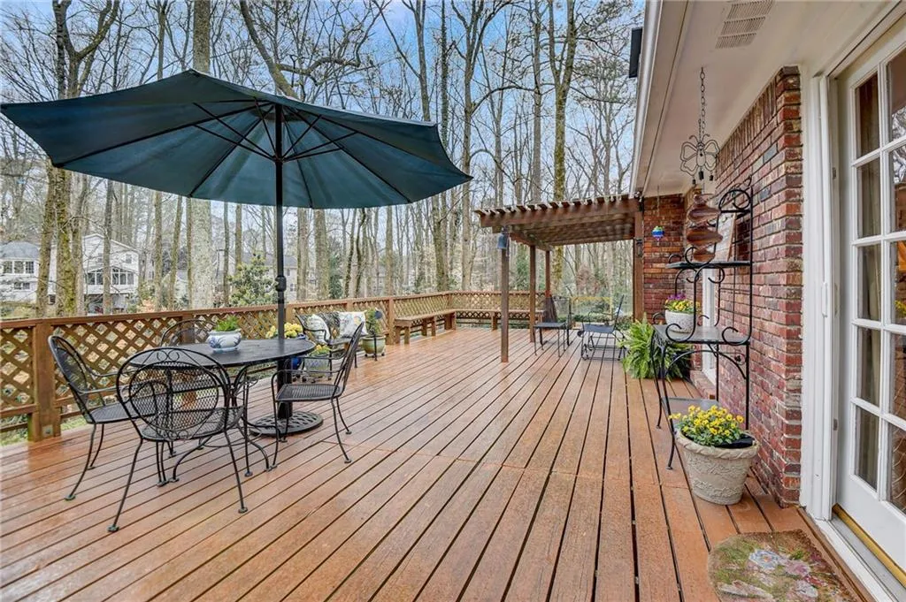 Wooden terrace with a pergola
