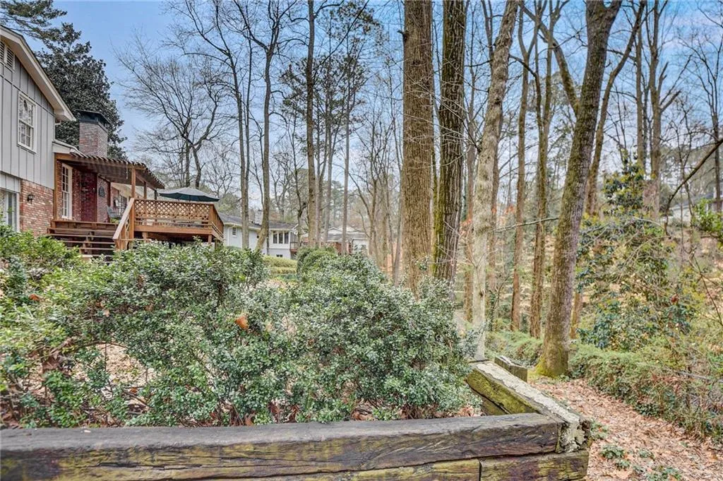 View of yard with a deck