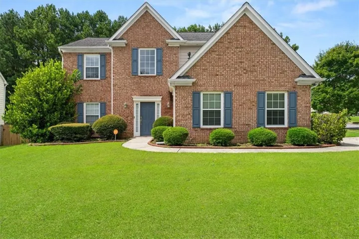 Brick exterior with white trim