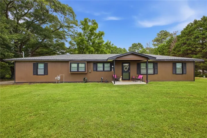 Single-story property with a brown exterior facade