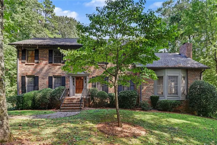 Brick exterior construction with a covered entrance
