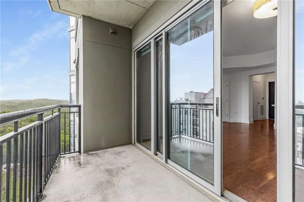 Birds eye view of property featuring a view of city and a water view