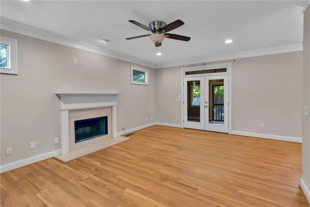 Hardwood flooring, crown molding, and recessed lighting