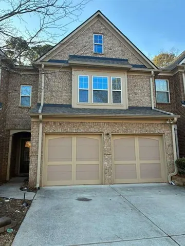 Brick exterior with a gabled roofline