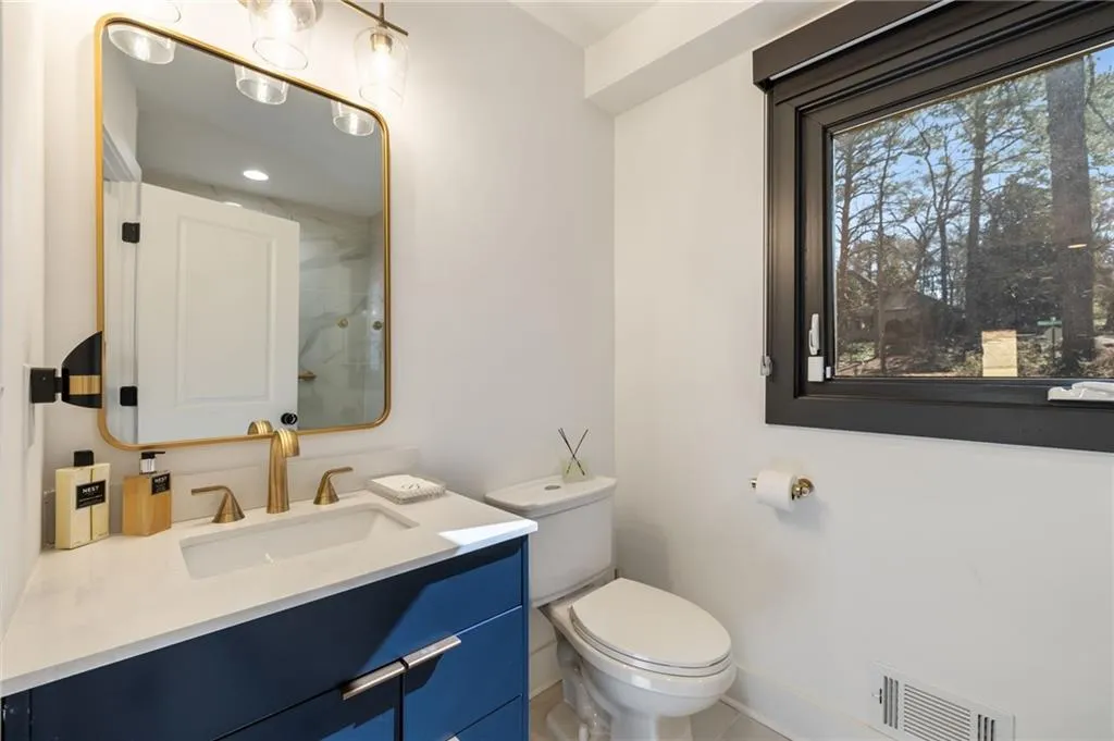 White vanity countertop with an integrated rectangular sink