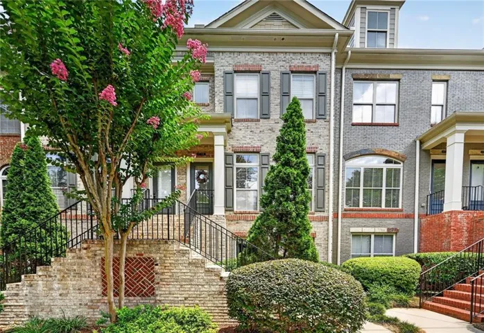 All brick 3 bedroom, 3 bathroom stunning townhome with great curb appeal.