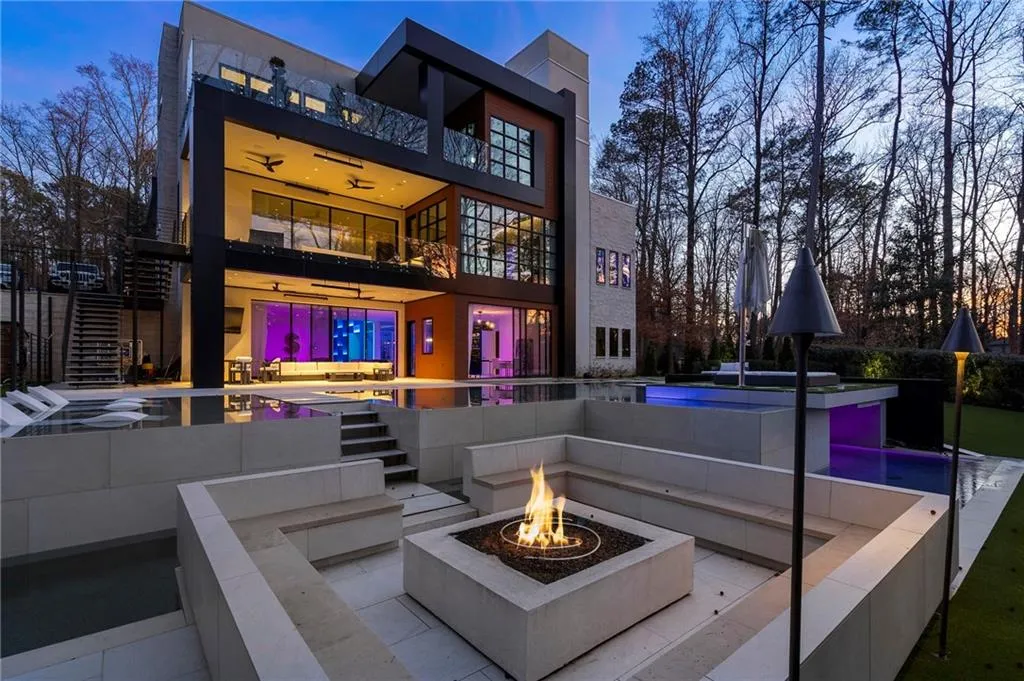 Striking architecture.  Resort style pool with grotto, firepit seating, sun shelf and spa.