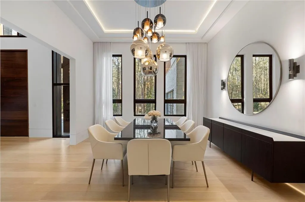 Recessed ceiling lighting controlled by Lutron whole house system.