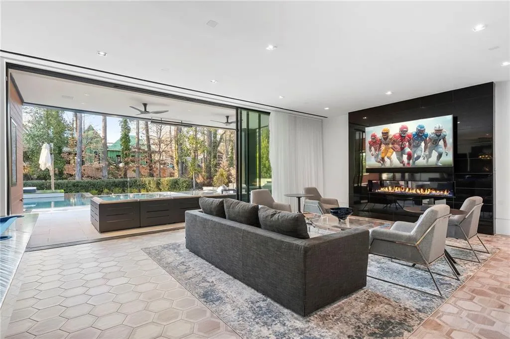 Triple pocket doors open all the way that create an indoor outdoor living environment.