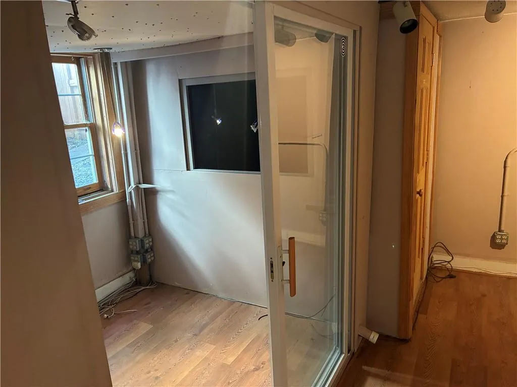 Bathroom featuring light wood-type flooring