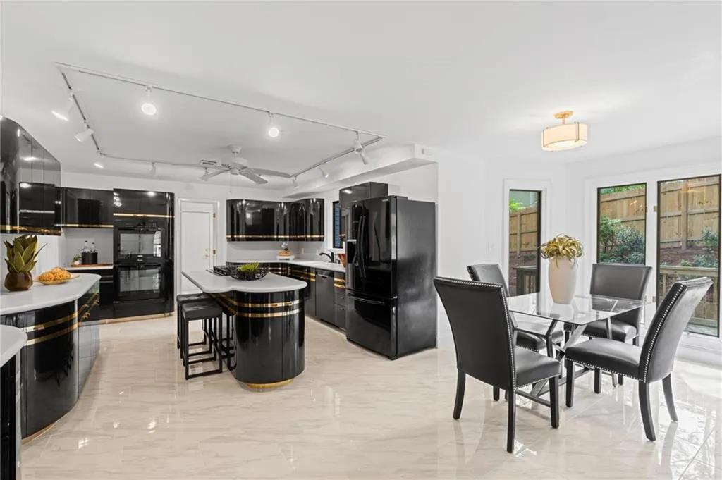 great space with a bright, window-lined breakfast nook for a spacious space to eat casual meals at home