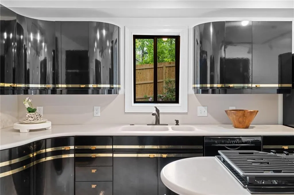 a true piece of art, featuring beautiful custom rounded cabinets made from