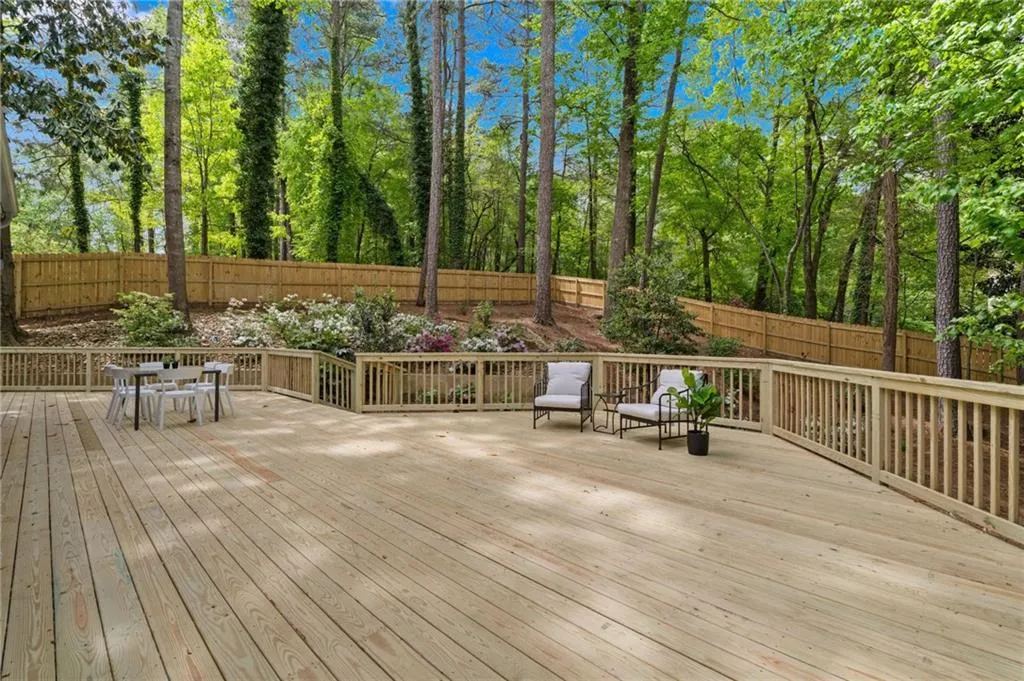 Brand new, HUGE deck perfect to host parties, family functions, and entertain pets - multiple space for outdoor living area plus al fresco dining space