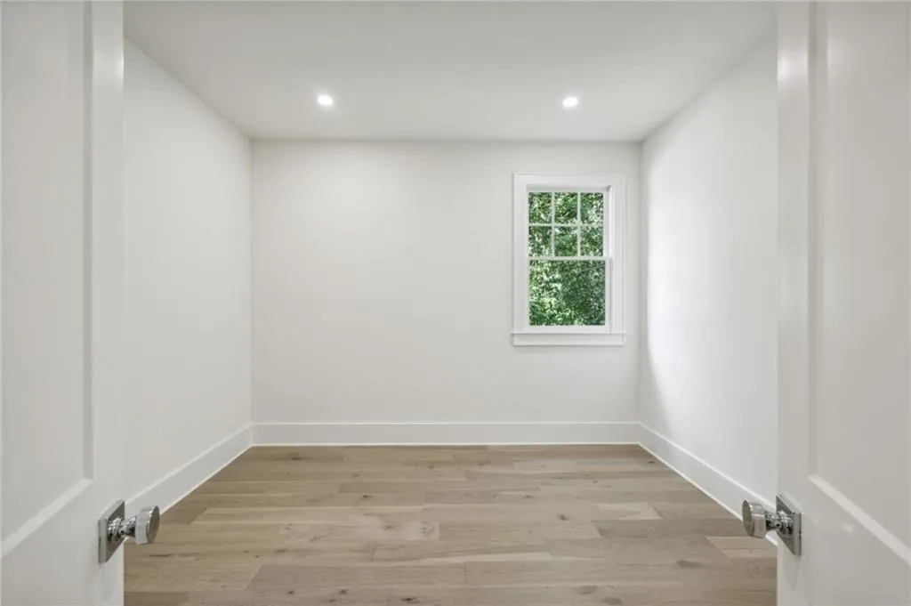 Spare room with light hardwood / wood-style flooring