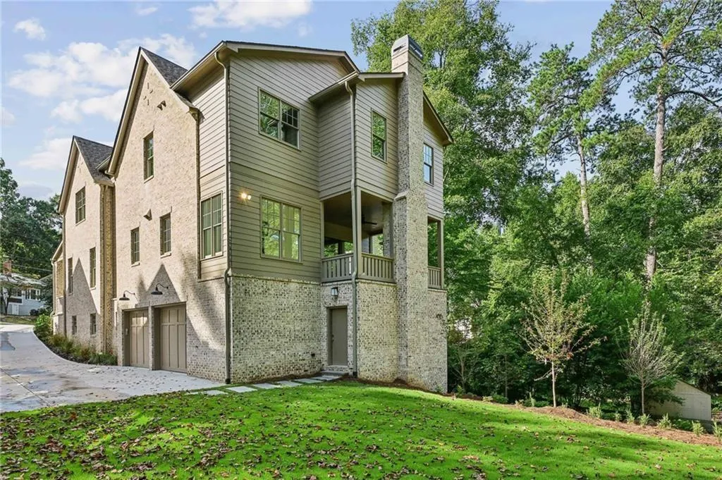 View of property featuring a garage