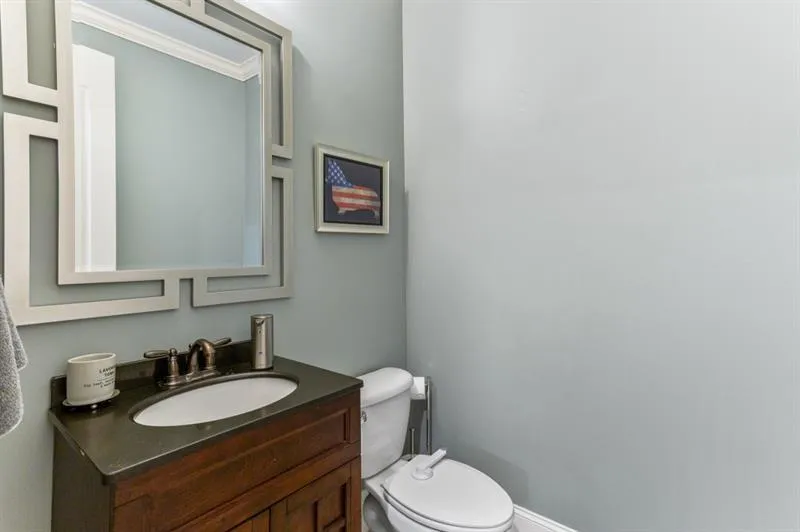 Bathroom with vanity and toilet