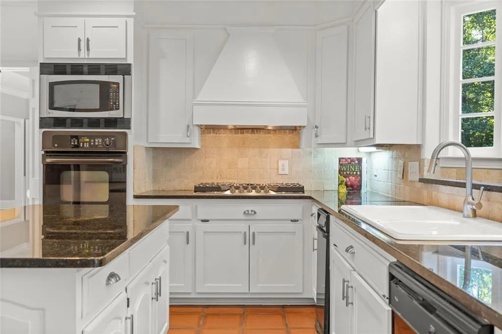Featuring new 5-burner gas cook top and new vent hood