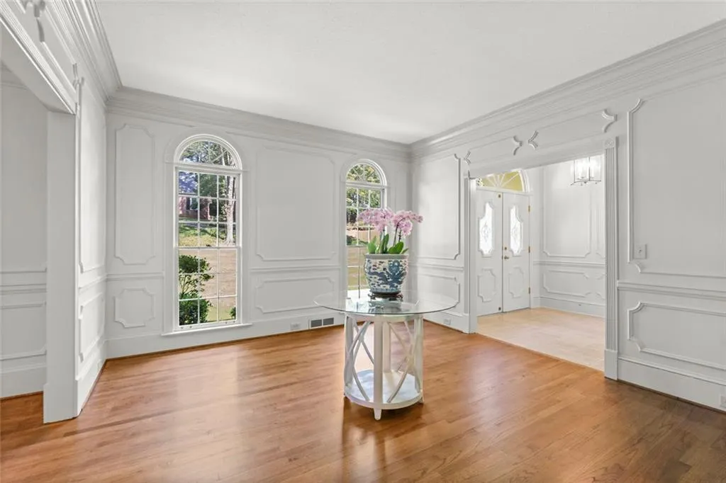 Library/Living room off entry hall, showing gorgeous mill work