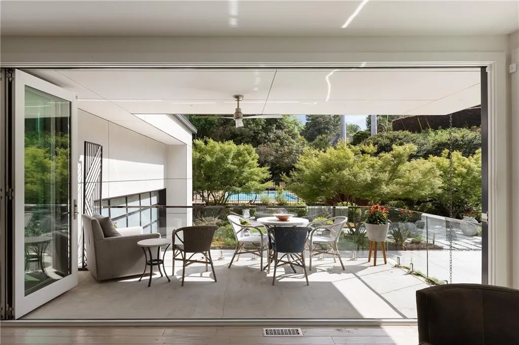 Family room with accordion doors to covered patio