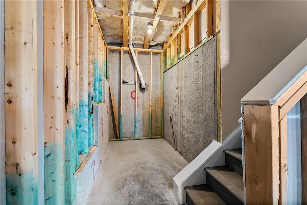 Unfinished below grade area with stairs