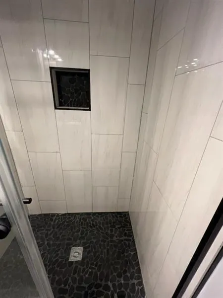 Bathroom with a stall shower