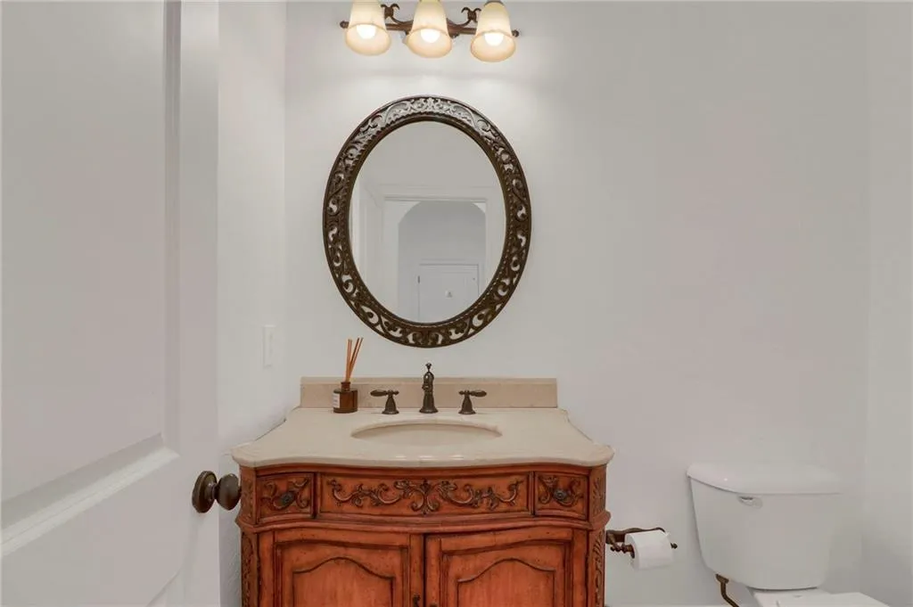 Bathroom featuring toilet and vanity