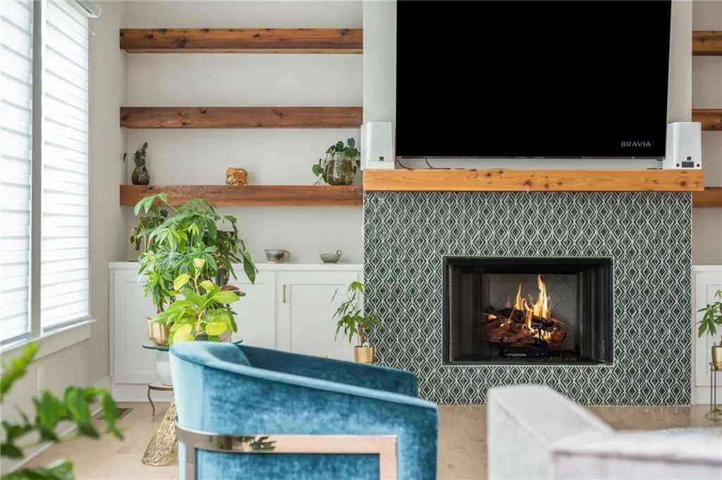 Living room featuring a lit fireplace
