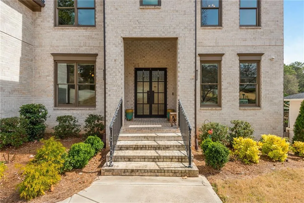Entrance to property featuring beautiful doors