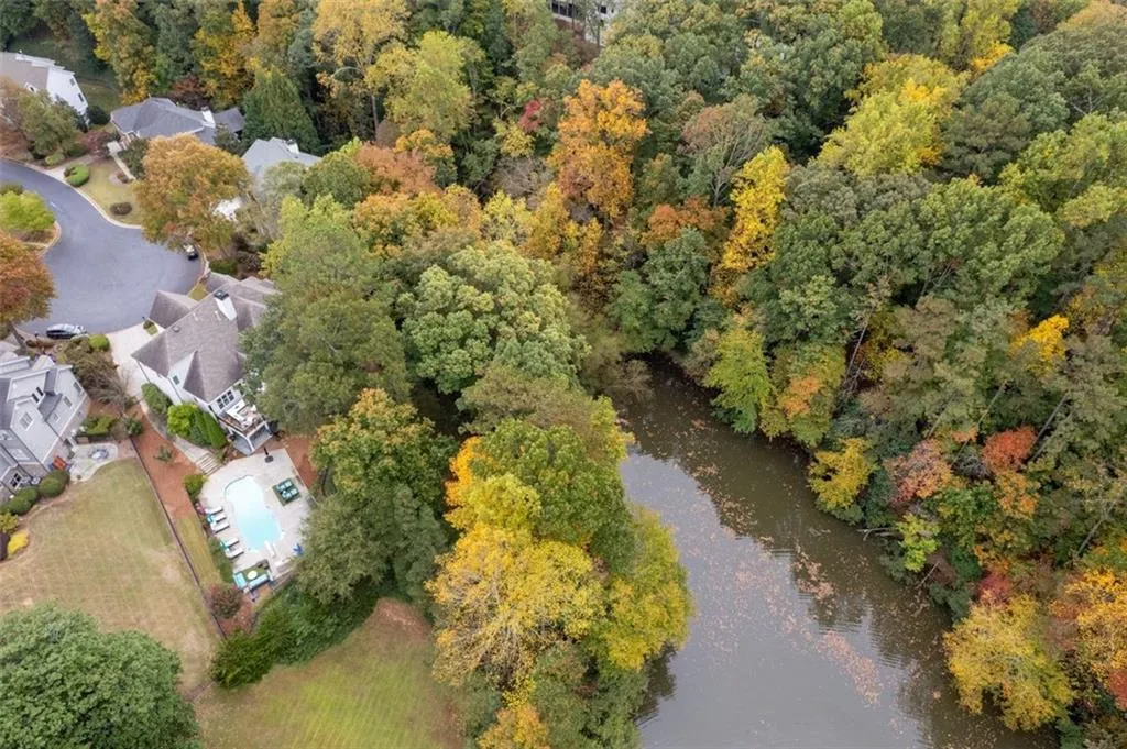 house and lake with beautiful trees. house and lake with beautiful trees.