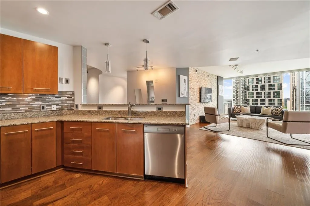Kitchen featuring Viking stainless steel, open floorplan and European cabinetry