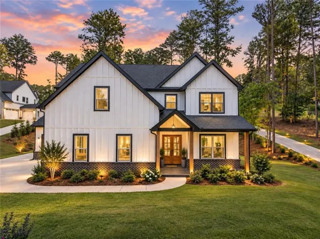 Contemporary farmhouse exterior with board and batten siding