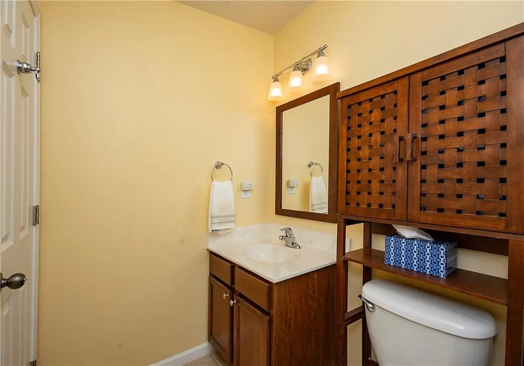 Bathroom with vanity and toilet