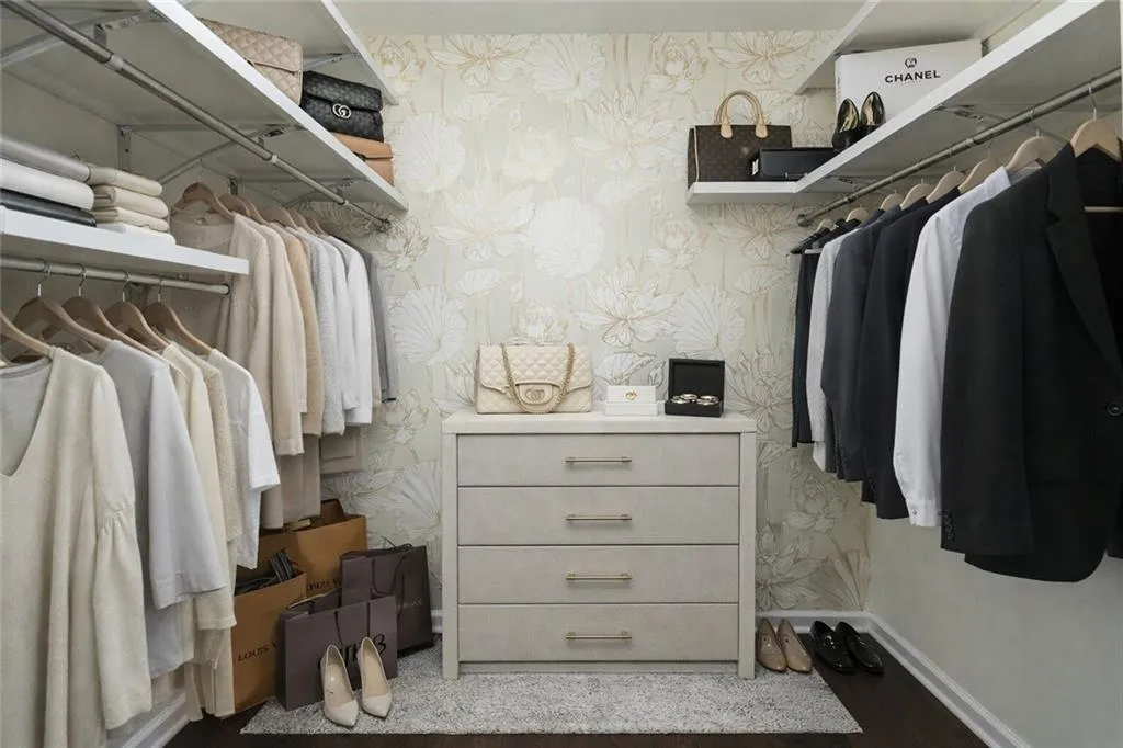 Walk in closet featuring wood finished floors