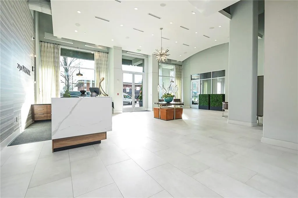 Building lobby with a high ceiling and recessed lighting