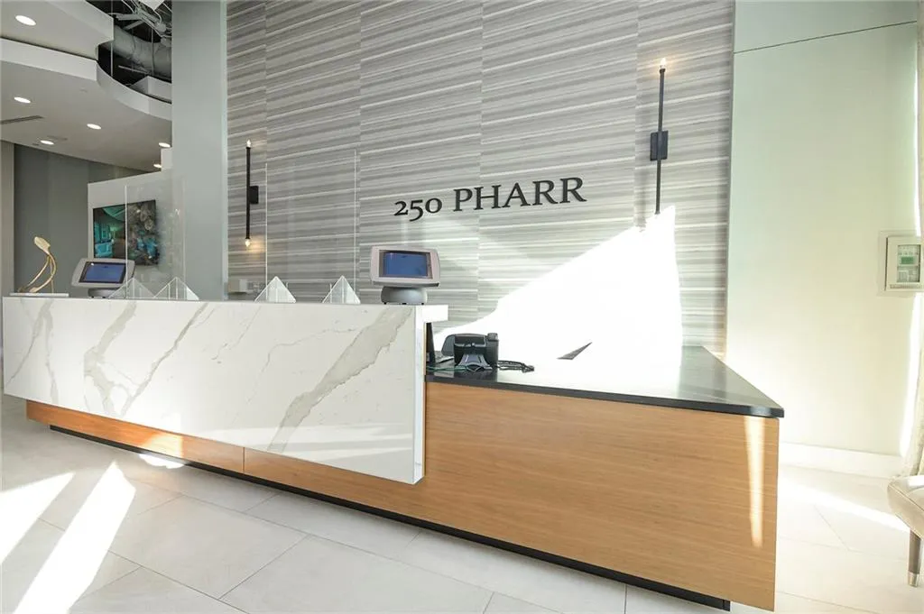 Reception featuring recessed lighting and tile walls