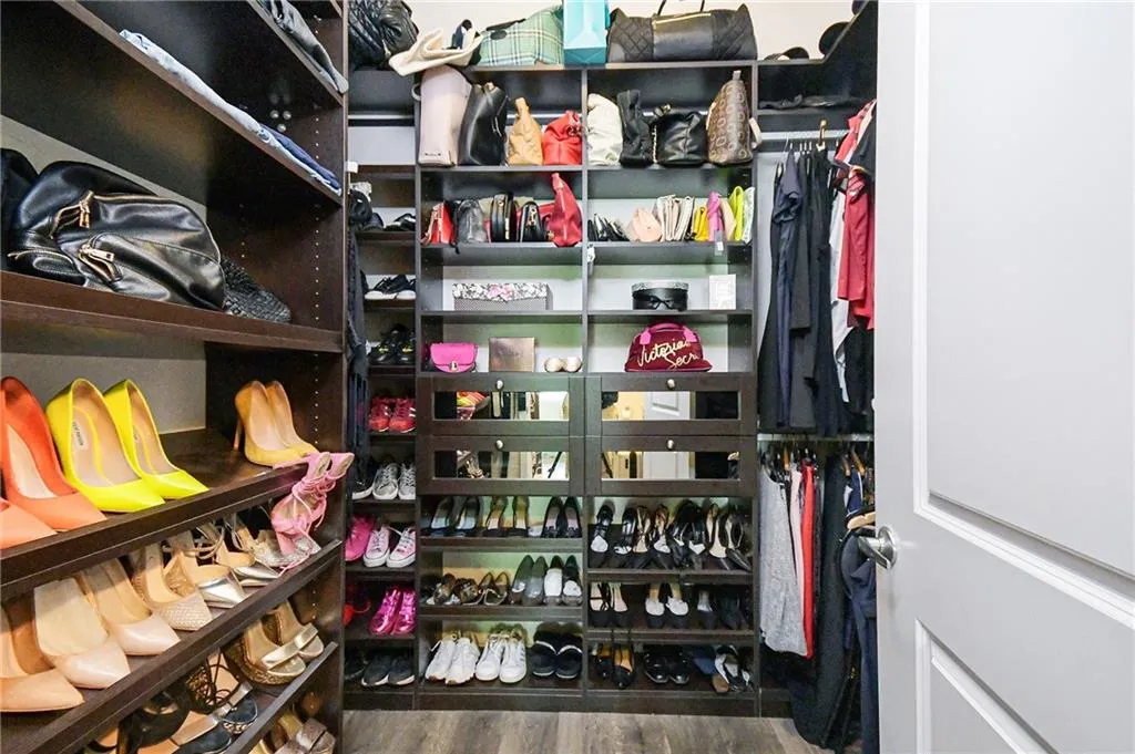 Spacious closet featuring wood finished floors