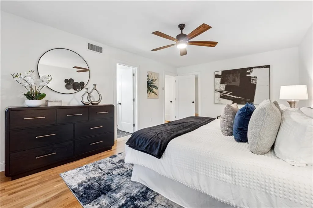 Bedroom featuring light wood finished floors and ceiling fan