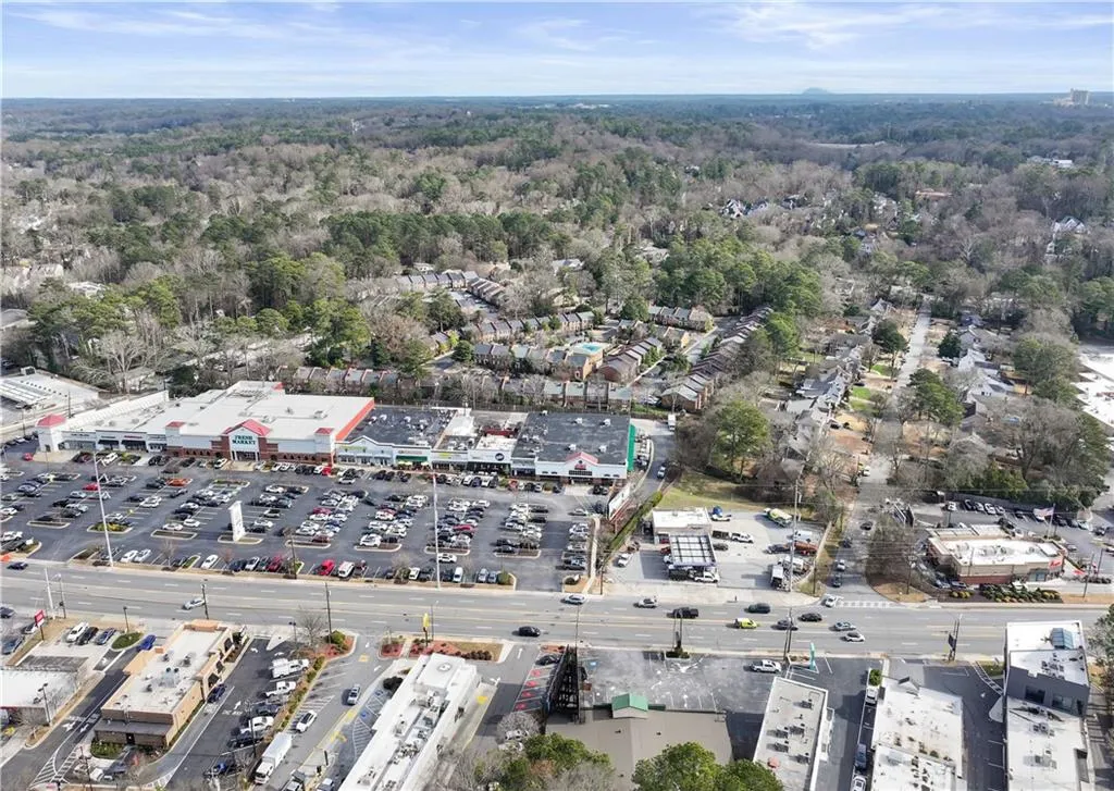 View of property location with a forest