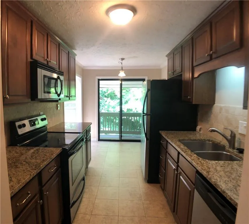 8740 Roswell Road Unit 8c, Atlanta, Georgia 30350, 3 Bedrooms Bedrooms, ,2 BathroomsBathrooms,Residential,Sold,8740 Roswell Road Unit 8c,6030712