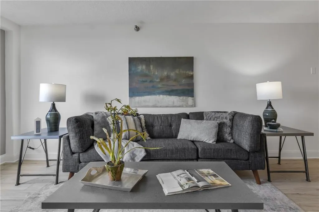 Living room with wood finished floors and baseboards