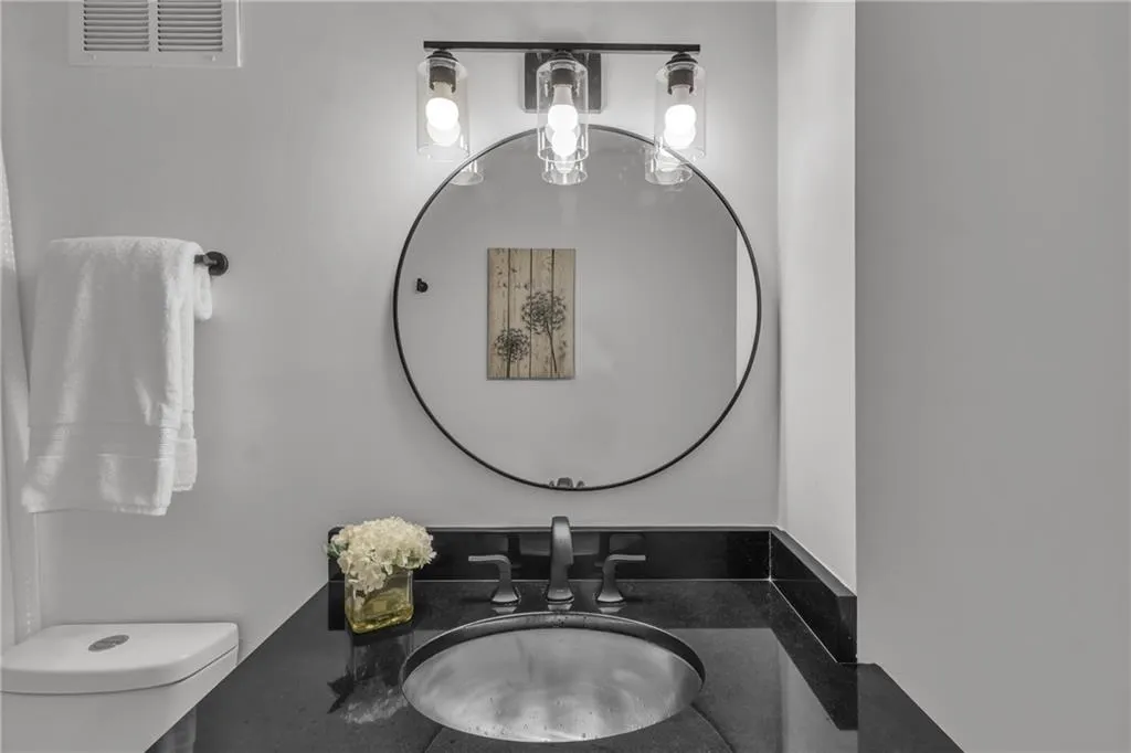 Bathroom featuring a sink and toilet