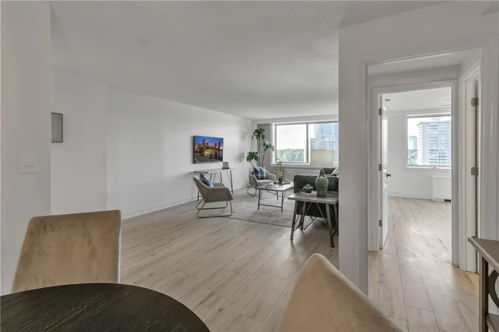 Living room with light wood-style floors