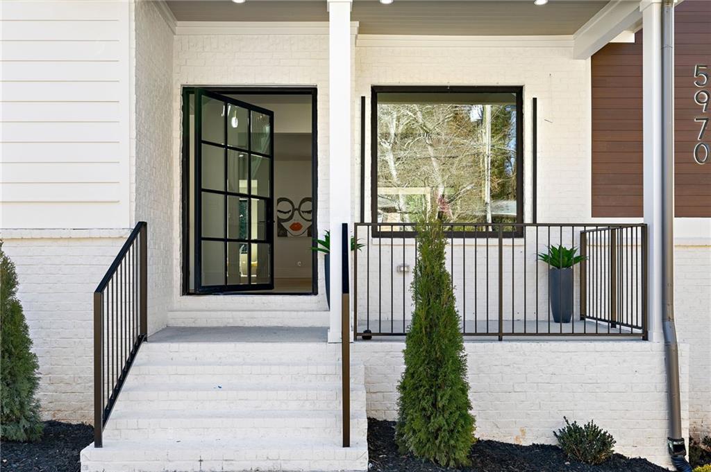 Don't miss out on the incredible opportunity to own this beautifully designed dream home nestled on a spacious 0.537-acre lot in the sought-after Hammond Hills neighborhood of Sandy Springs.