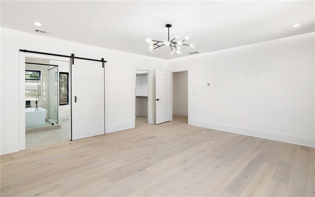 Step into luxury with the primary suite of this exceptional dream home. This sanctuary on the second level is a true retreat, offering an unparalleled level of comfort and sophistication.
