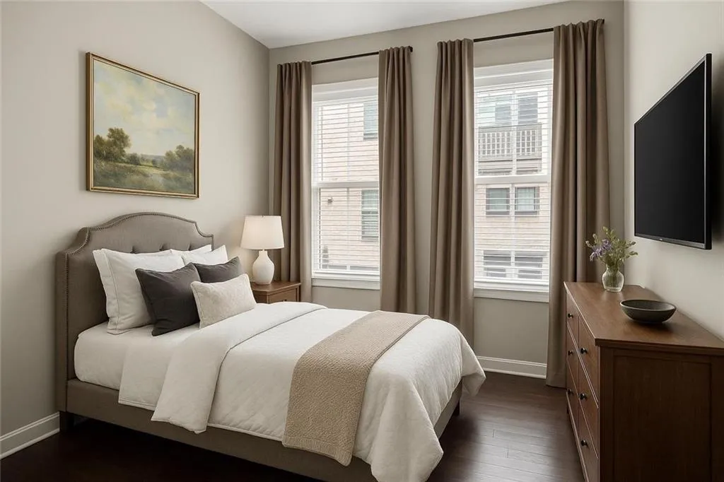 2nd bedroom virtually staged as a guestroom