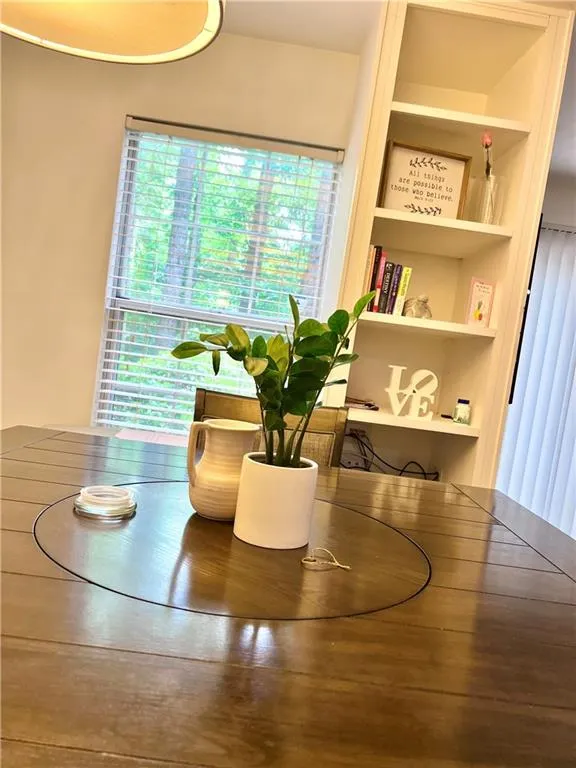 Dining room area with built-in bookcase