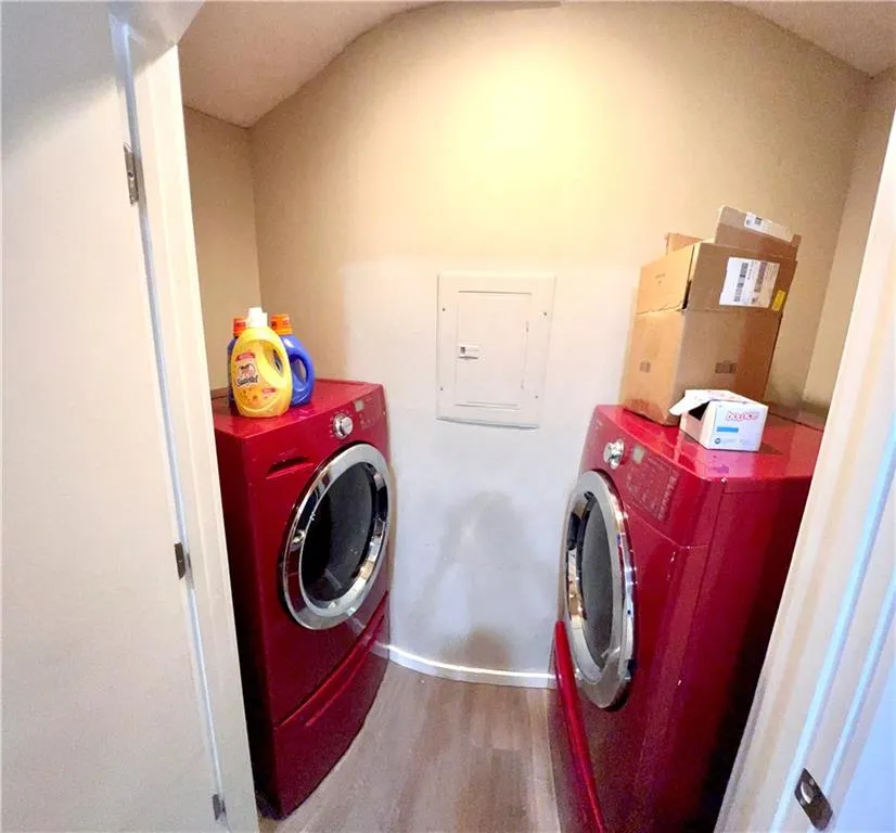 Laundry room off the kitchen with washer and dryer included