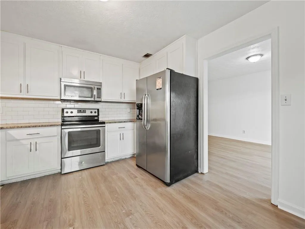 310 Winding River Drive Unit C, Atlanta, Georgia 30350, 3 Bedrooms Bedrooms, ,2 BathroomsBathrooms,Residential,For Sale,310 Winding River Drive Unit C,7636203