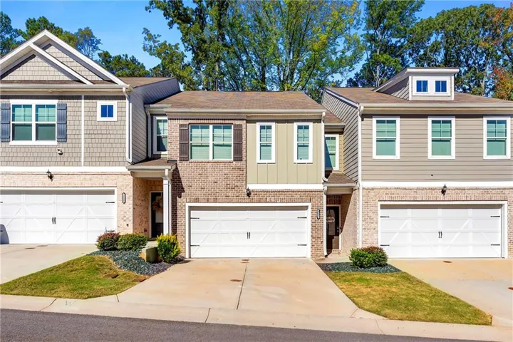 Brick and siding exterior with gabled roofline